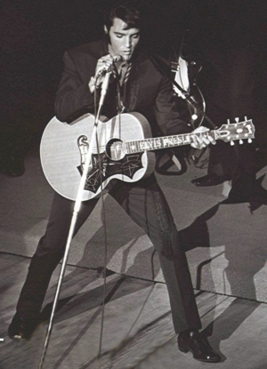 Fifty Generations Of Elvis Fans: photo of Elvis on stage in Las Vegas in 1969.